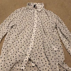 White and black heart-patterned blouse